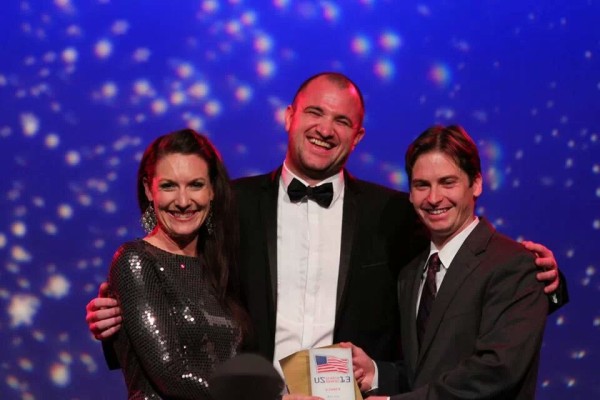 Elisabeth Osmeloski, US Search Awards presenter Gareth Hoyle and Greg Finn